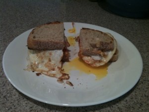 Tomato and egg sandwich on toasted sourdough. 